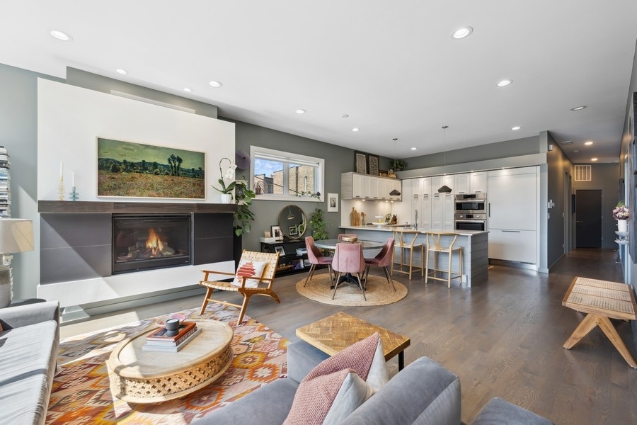 2046 West Rice Street, Unit 2 Chicago, IL 60622 - Photo 7 of 14 a living room with furniture and a fireplace