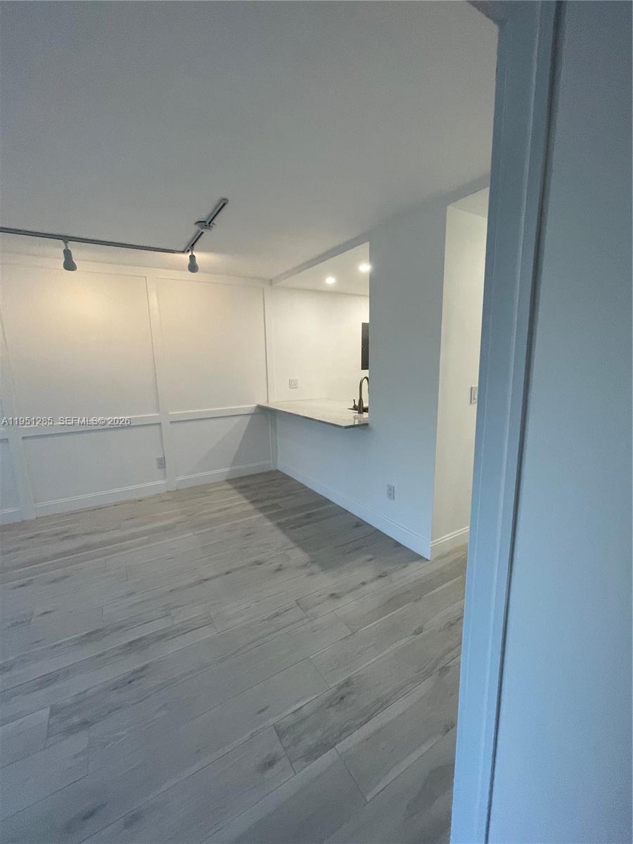 2160 Southwest 16th Avenue, Unit 115 Miami, FL 33145 - Photo 18 of 31 a view of a room with an empty space