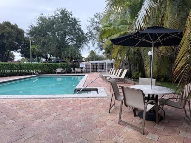 2160 Southwest 16th Avenue, Unit 115 Miami, FL 33145 - Photo 24 of 31 a view of outdoor space yard and patio