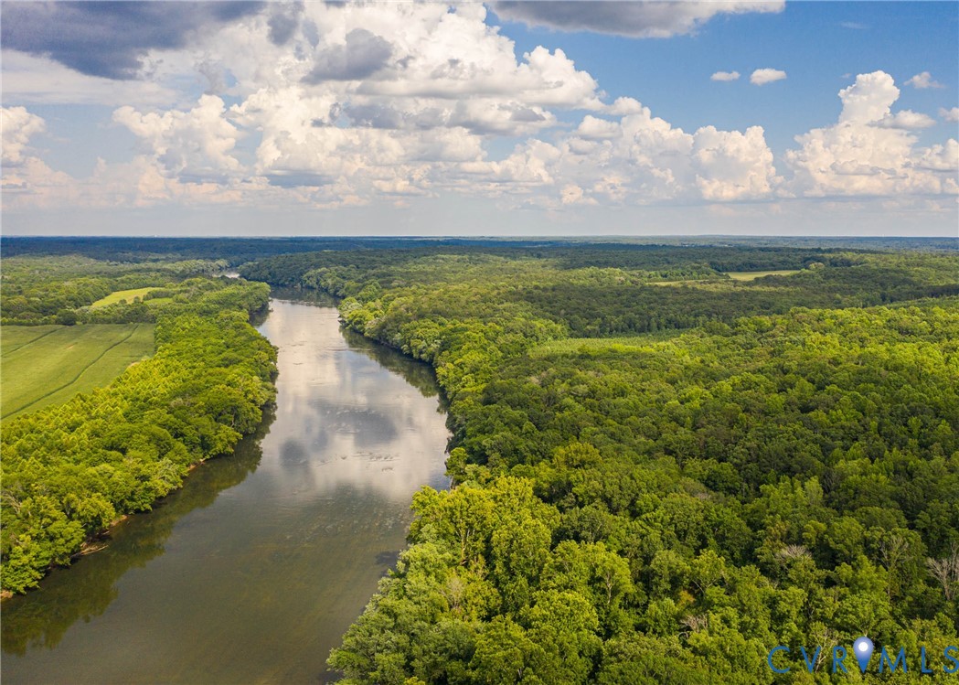 Bird's eye view of a nearby body of water and a fo
