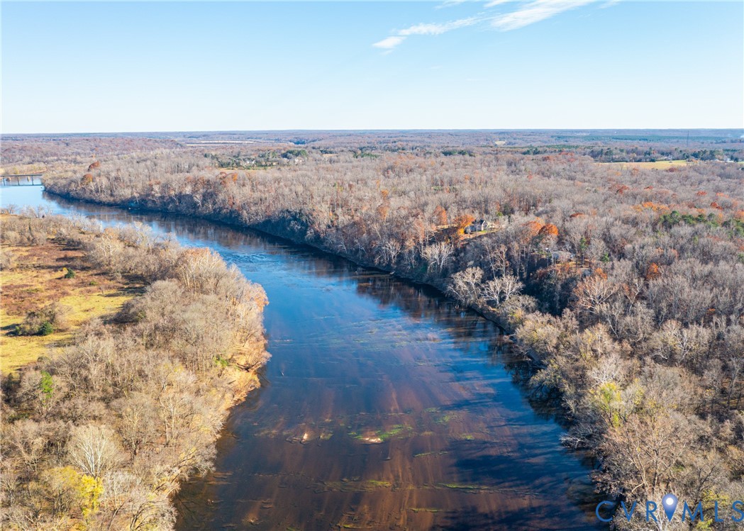 176 Ampthill Road Cartersville, VA 23027 - Photo 14 of 22 a view of a lake with mountains in the background