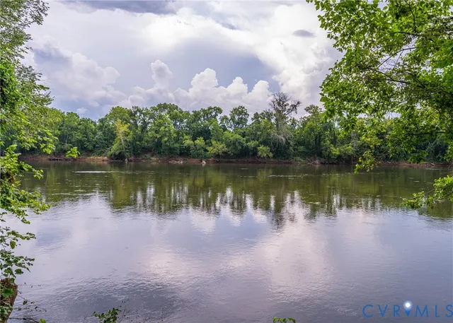 a view of a lake in front of a building