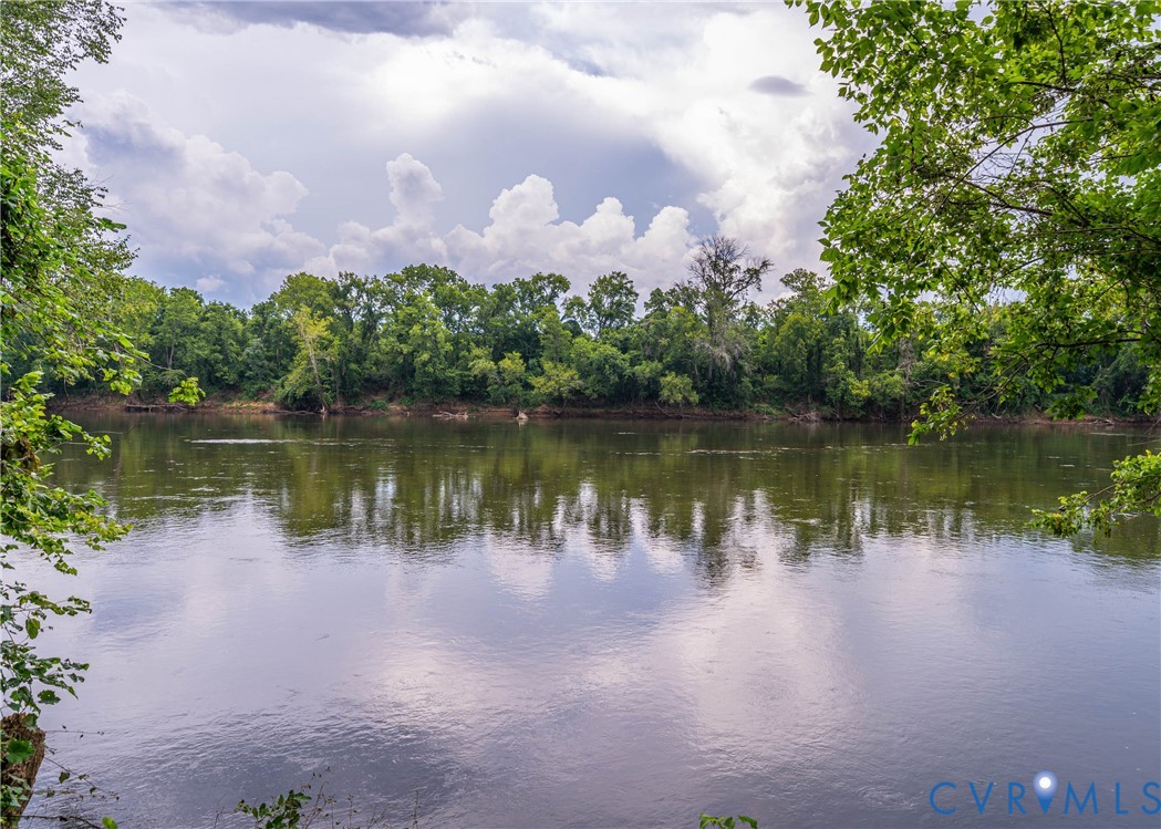 176 Ampthill Road Cartersville, VA 23027 - Photo 5 of 22 a view of a lake in front of a building