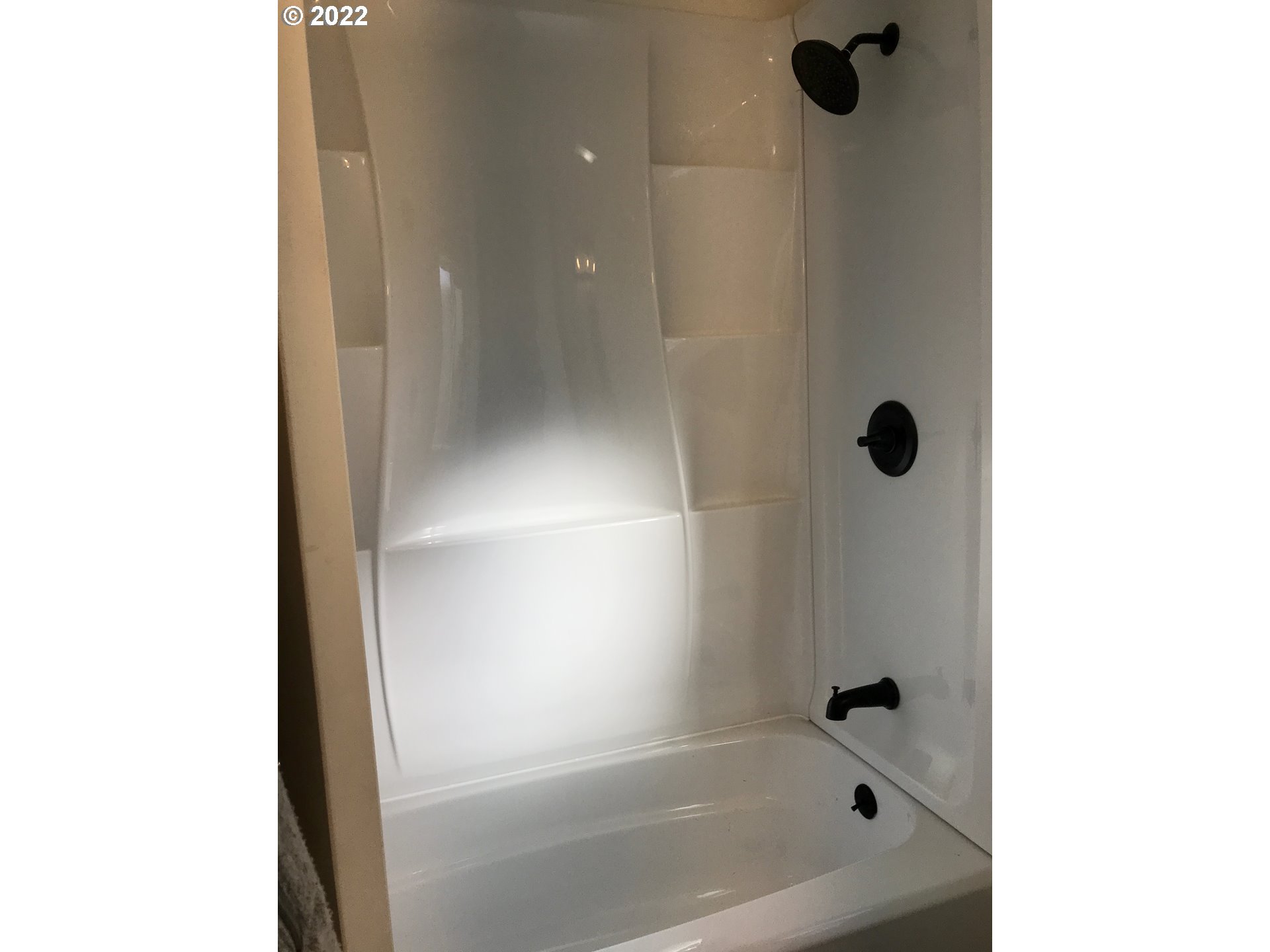 1141 1st Street Springfield, OR 97477 - Photo 9 of 13 a bathroom with a bathtub