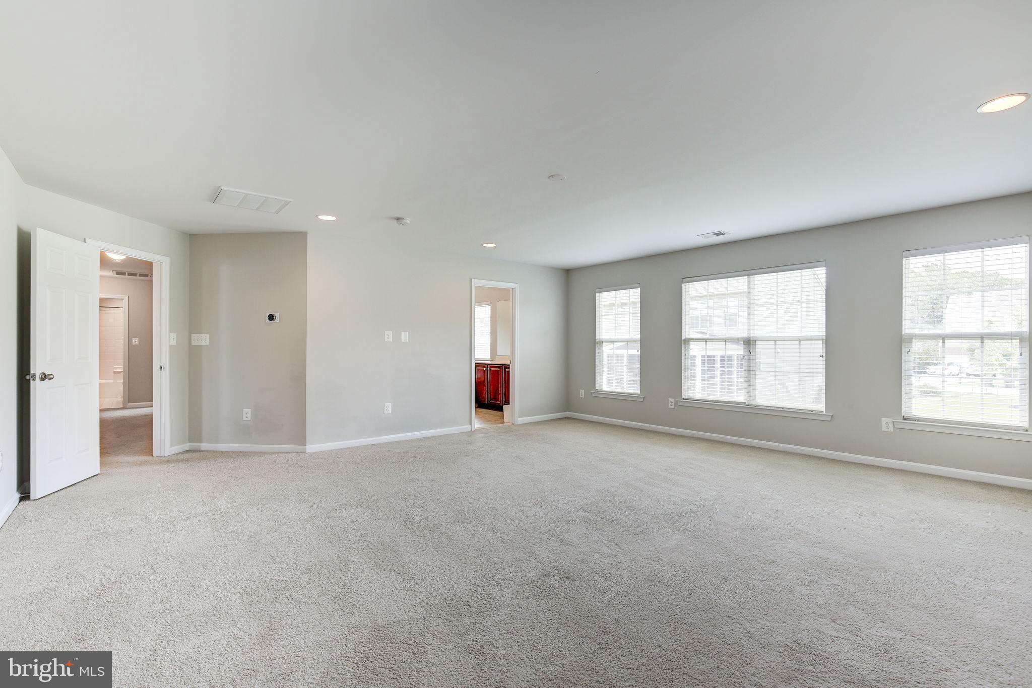 2311 Whitley Road Baltimore, MD 21209 - Photo 22 of 47 a view of an empty room with a window