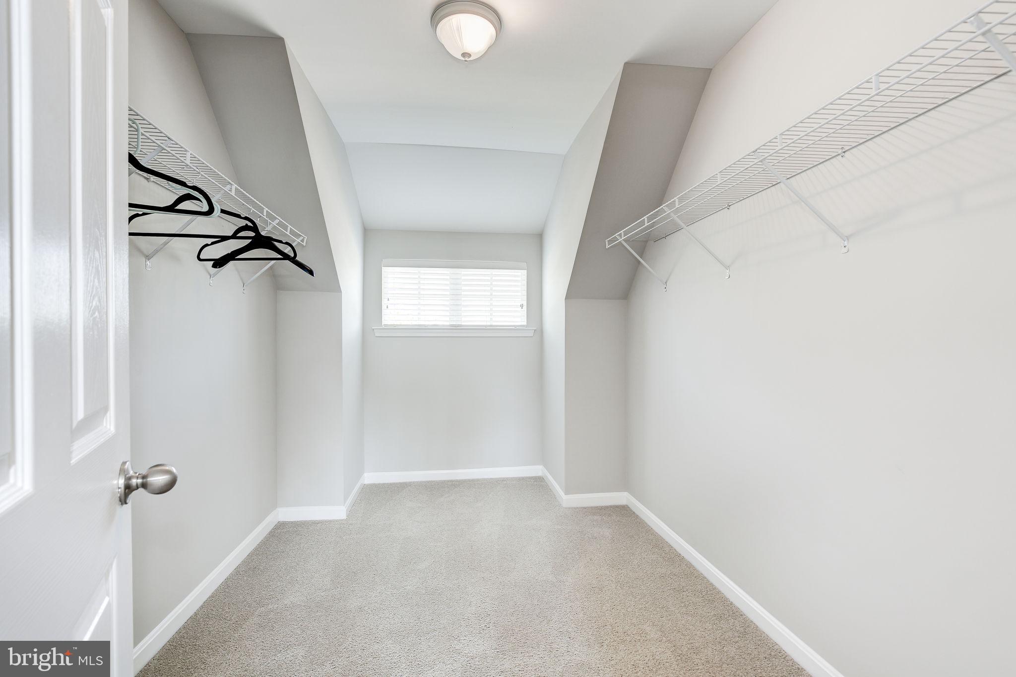 2311 Whitley Road Baltimore, MD 21209 - Photo 25 of 47 an empty room with windows