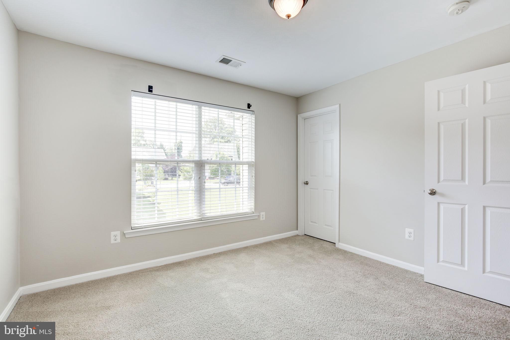 2311 Whitley Road Baltimore, MD 21209 - Photo 40 of 47 an empty room with a window