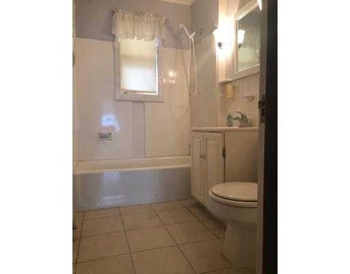 113 King Philip Road Worcester, MA 01606 - Photo 8 of 16 a bathroom with a toilet and a shower
