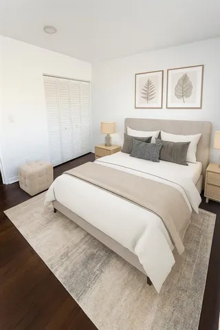 a large white bed in a white room