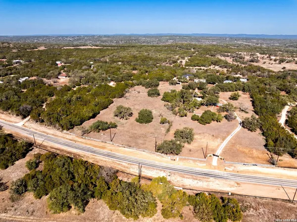an aerial view of residential building with parking space