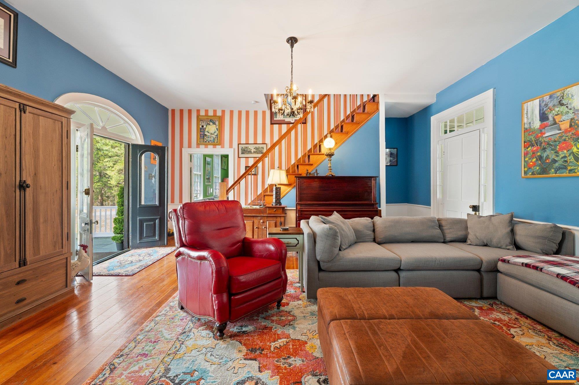 14910 Western Mill Road Lawrenceville, VA 23868 - Photo 18 of 73 a living room with furniture stairs and a window
