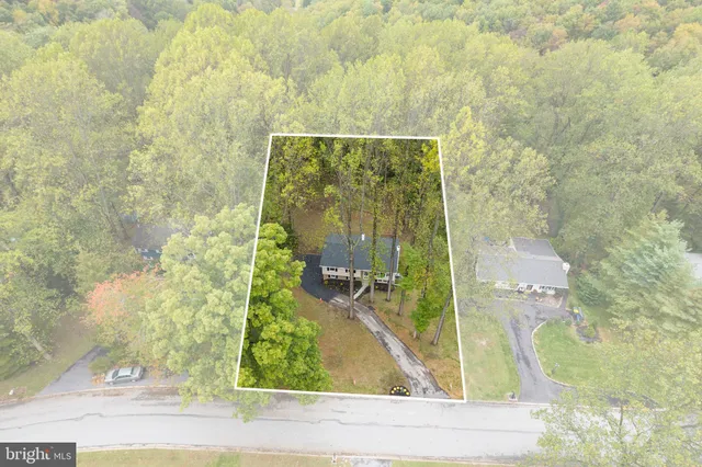 swimming pool with outdoor seating and yard