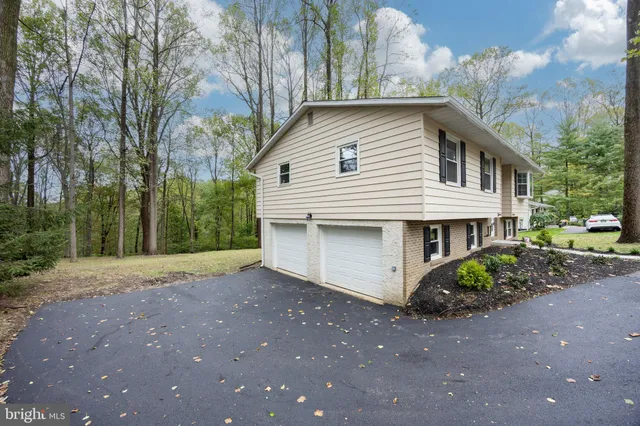 a view of balcony with wooden floor and fence