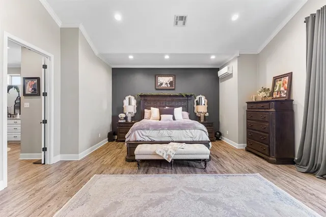 a bedroom with a bed and furniture