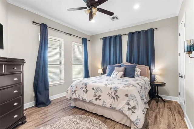 a spacious bathroom with a double vanity sink and mirror
