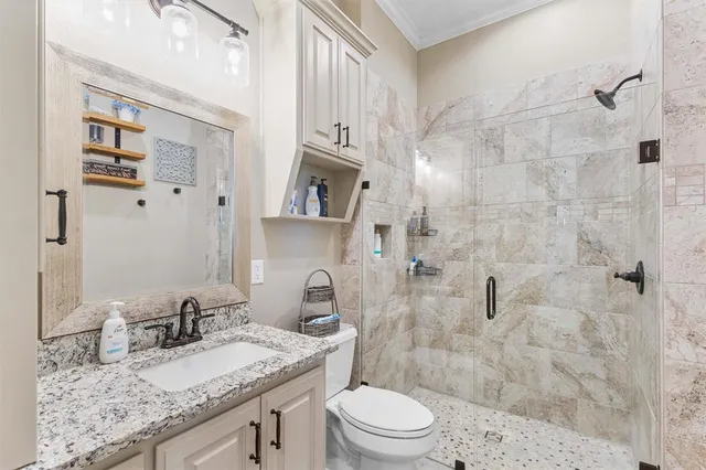 a bedroom with bed and window