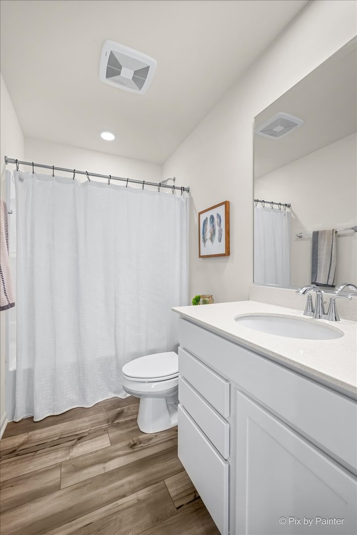 1623 BENTZ Way Batavia, IL 60510 - Photo 15 of 29 a bathroom with a sink a toilet and shower