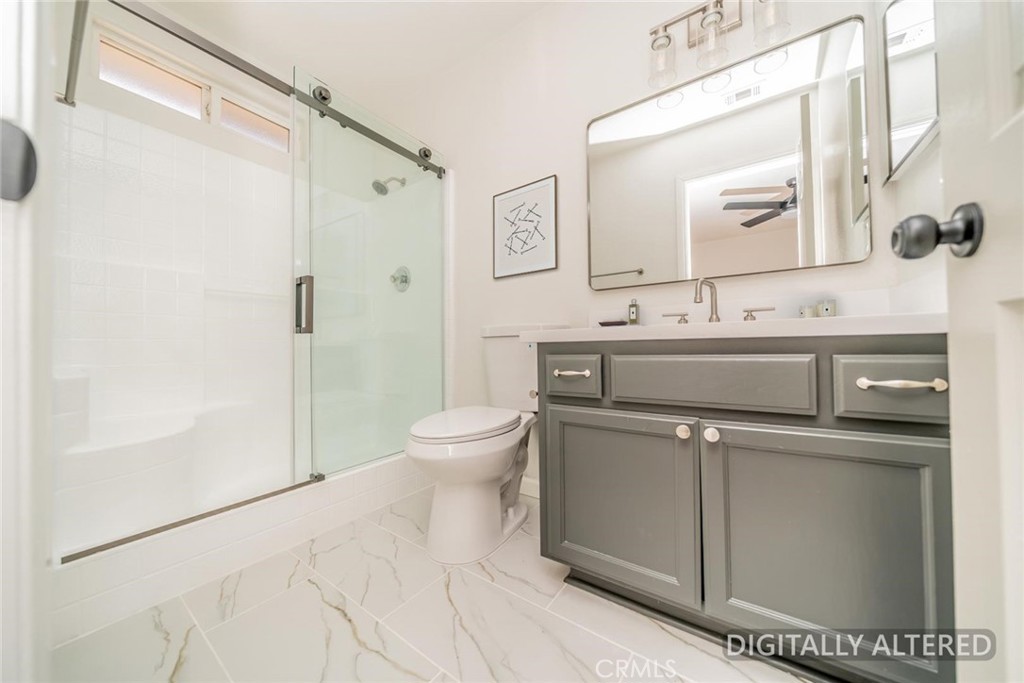 13913 Cronese Road Apple Valley, CA 92307 - Photo 21 of 29 Primary Bathroom (Disclaimer: Some images have been digitally enhanced with virtual staging to illustrate potential room layouts and furnishings. Actual property condition and features may vary. Buyer to verify all information independently).