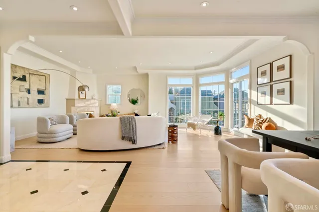 a bedroom with a bed and a potted plant