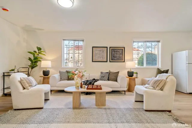 a view of a chair and table in backyard