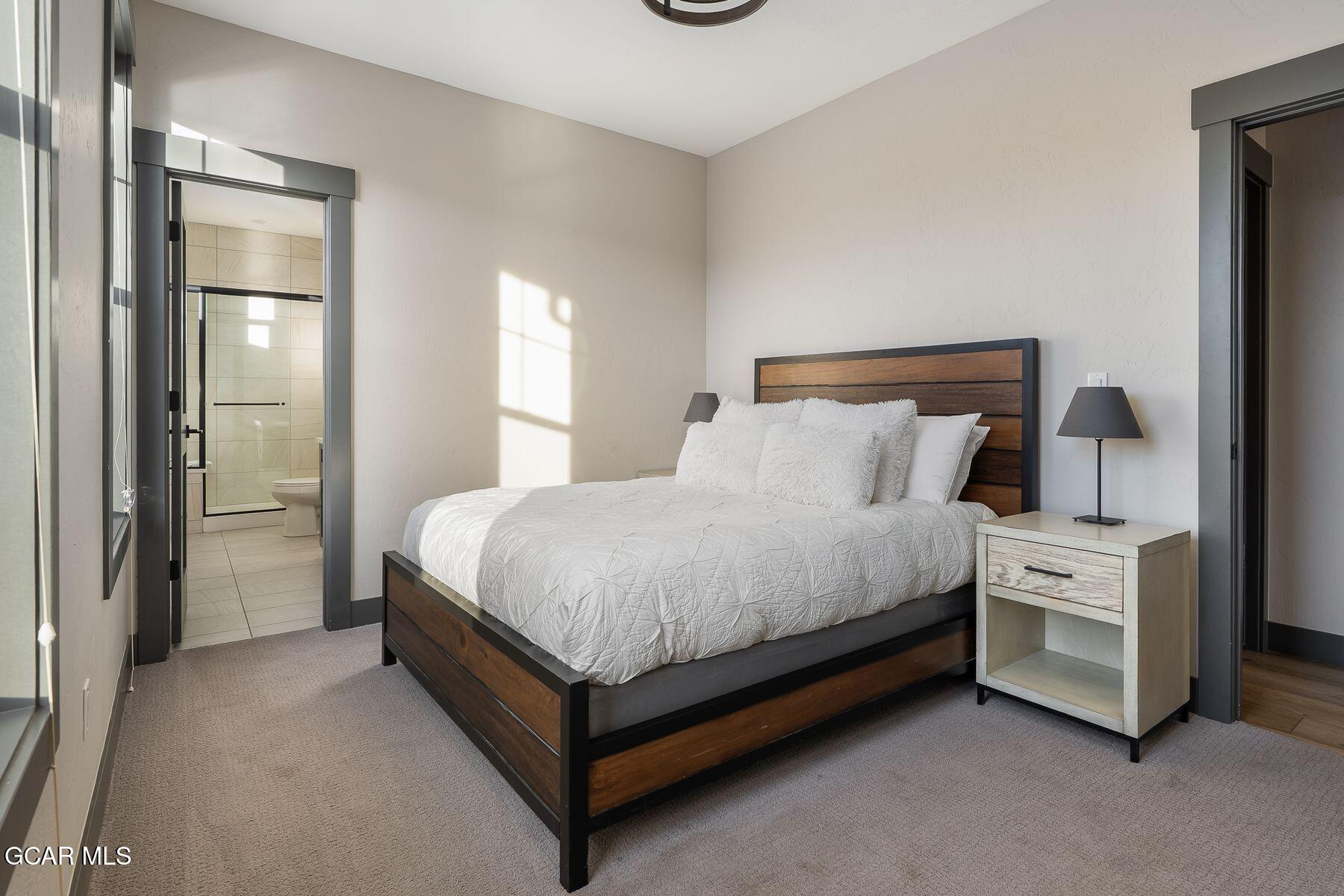 102 Eagle Ridge Drive Granby, CO 80446 - Photo 17 of 44 a bed room with a bed and a closet