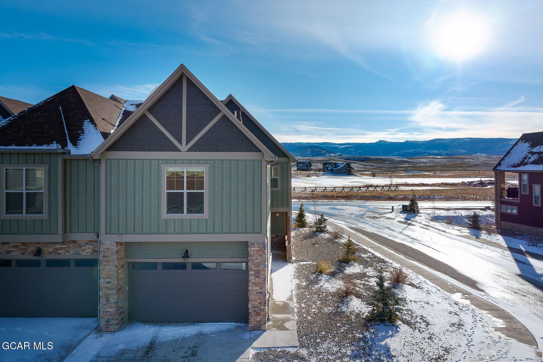 102 Eagle Ridge Drive Granby, CO 80446 - Photo 35 of 44 a view of a house with a yard and sitting area