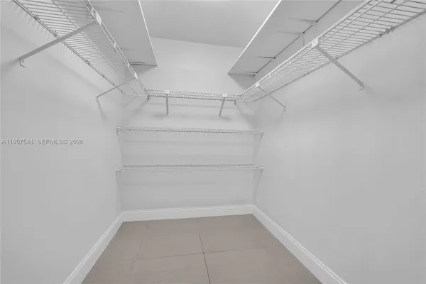 a view of a room with racks on the wall