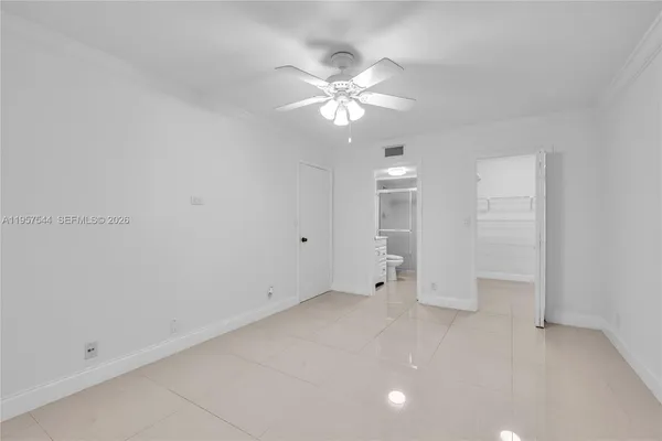 a bathroom with a sink a toilet and vanity