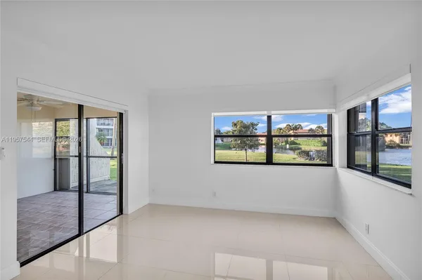 a view of a room with a large window