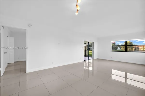 a view of an empty room with window