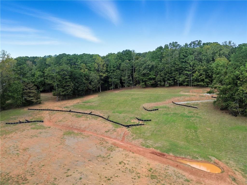 14040 Providence Road Milton, GA 30004 - Photo 11 of 17 a view of a golf course with a lake
