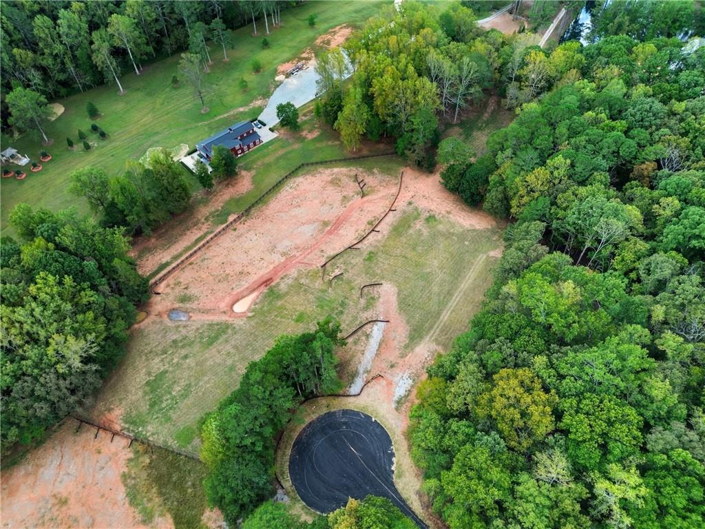 14040 Providence Road Milton, GA 30004 - Photo 16 of 17 an aerial view of residential house with outdoor space and trees all around