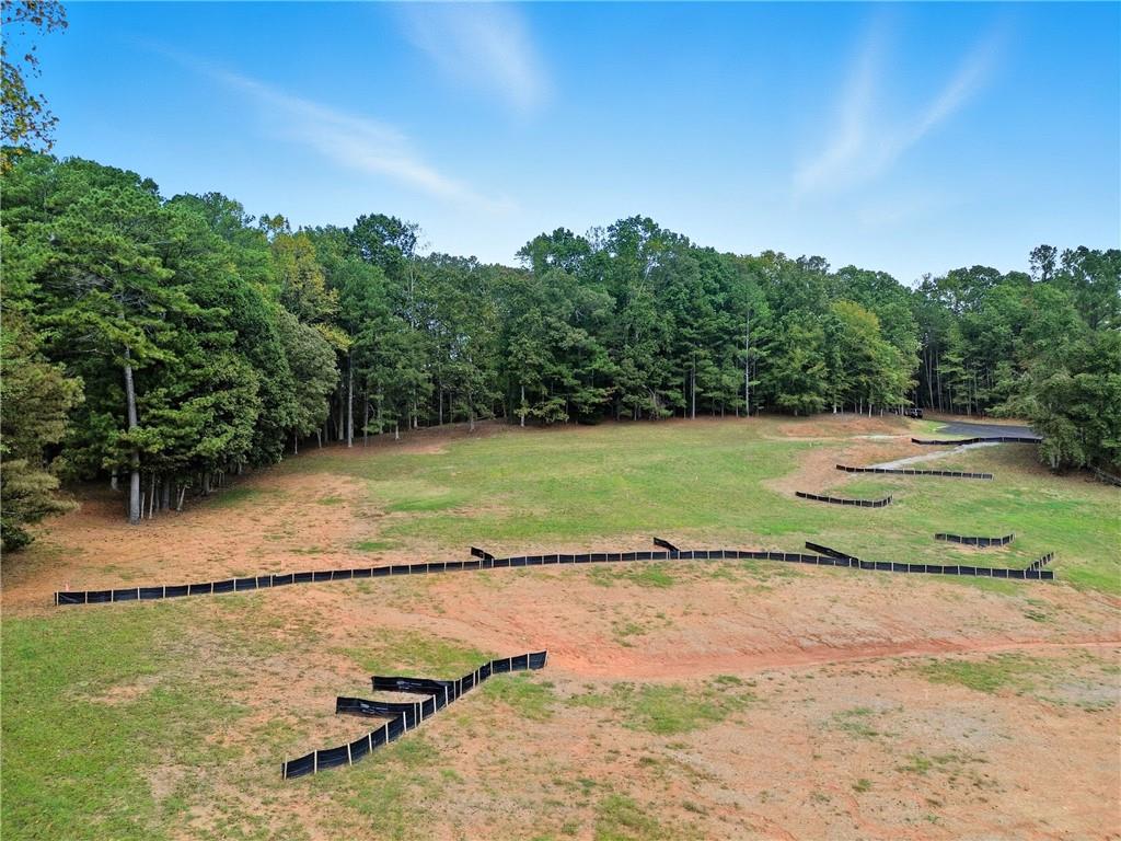 14040 Providence Road Milton, GA 30004 - Photo 10 of 17 a view of a lake with a yard