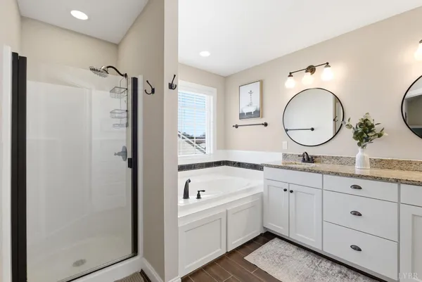 a bedroom with a bed window and a desk