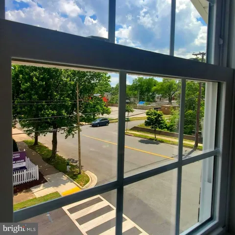 a view of swimming pool from a window