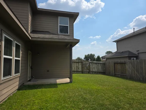 a view of a backyard with a garden