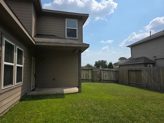 a view of a backyard with a garden