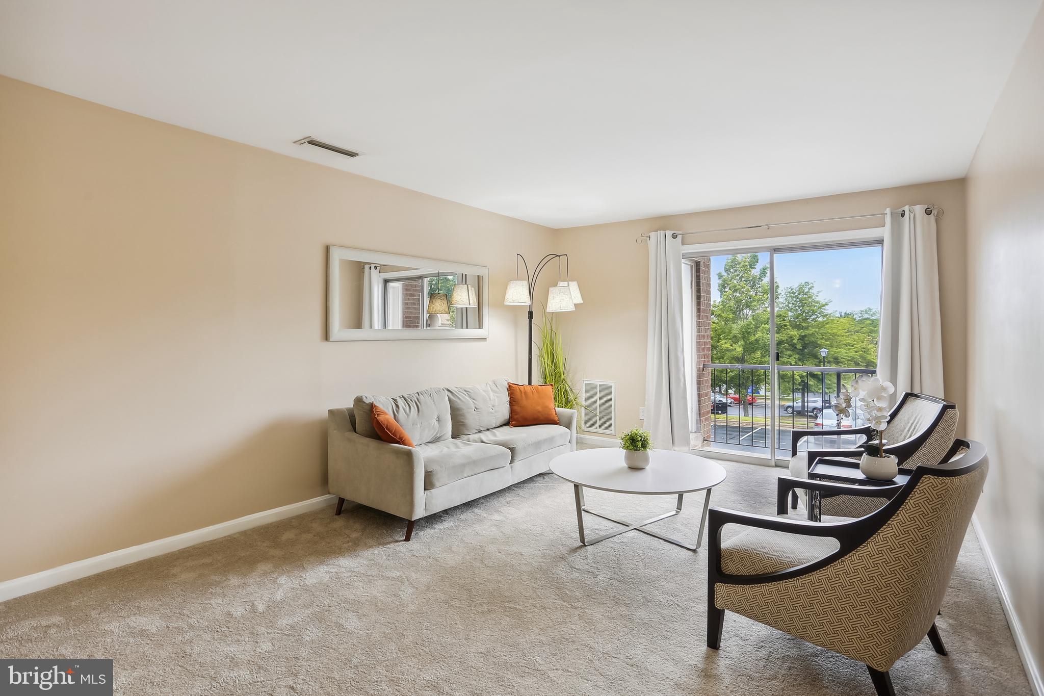 14800 Rydell Road, Unit 201 Centreville, VA 20121 - Photo 16 of 31 Spacious Living Room with Access to Balcony