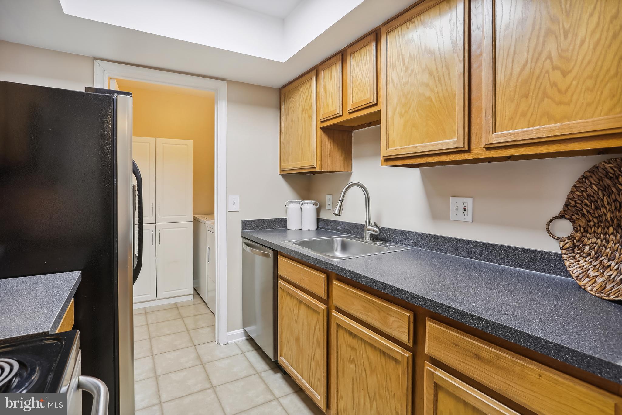 14800 Rydell Road, Unit 201 Centreville, VA 20121 - Photo 24 of 31 Separate Laundry Room with Full Size Washer/Dryer