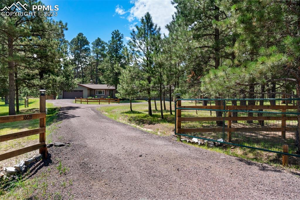 a view of a park with swings and slides