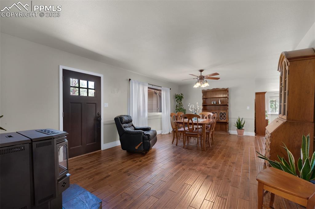 16635 High Tree Drive Elbert, CO 80106 - Photo 13 of 50 a living room with furniture and a wooden floor