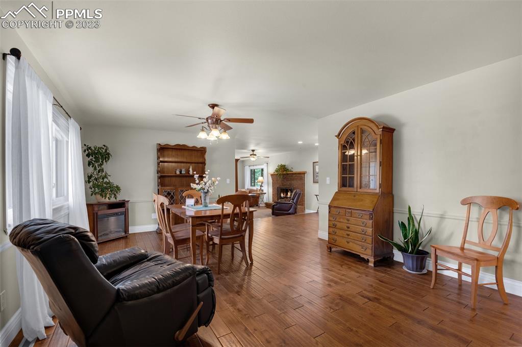 16635 High Tree Drive Elbert, CO 80106 - Photo 3 of 50 a living room with furniture kitchen view and a wooden floor