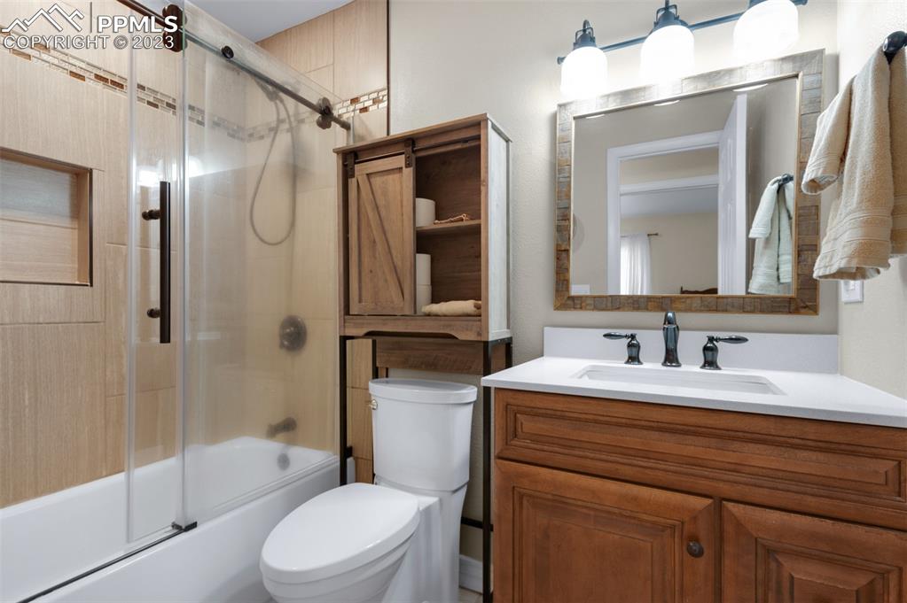 16635 High Tree Drive Elbert, CO 80106 - Photo 33 of 50 a bathroom with a sink a toilet and shower
