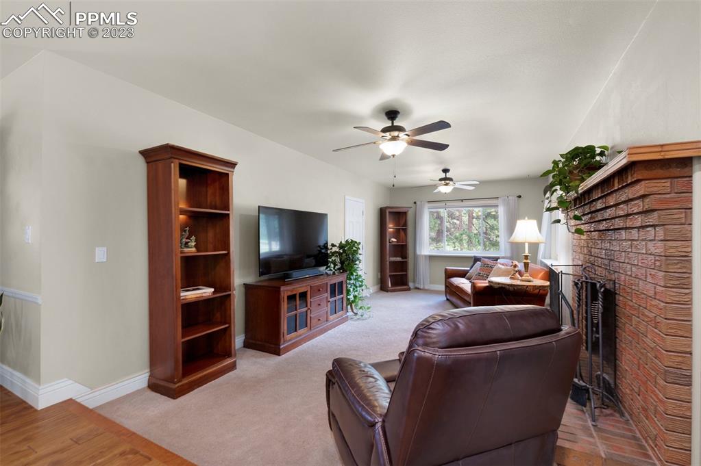 16635 High Tree Drive Elbert, CO 80106 - Photo 4 of 50 a living room with furniture and a flat screen tv