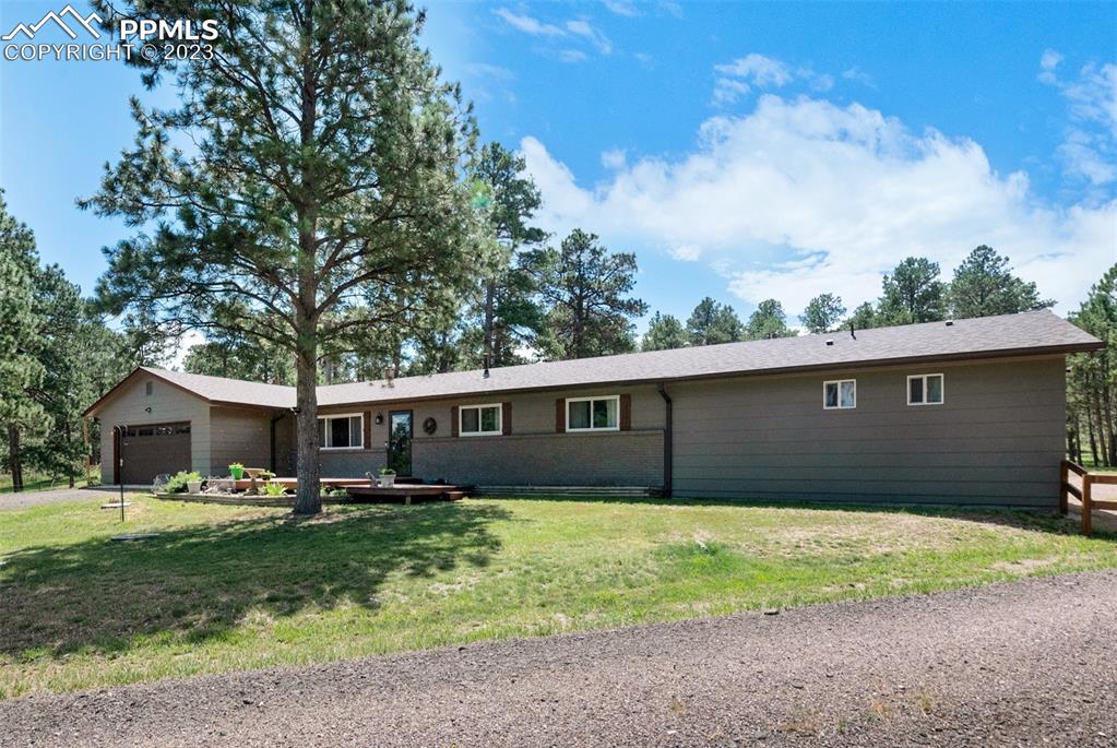 16635 High Tree Drive Elbert, CO 80106 - Photo 46 of 50 a front view of house with yard and green space
