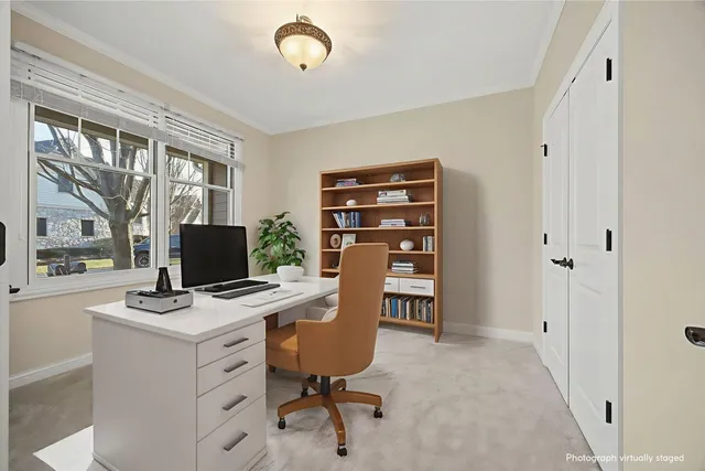 a view of a workspace with furniture