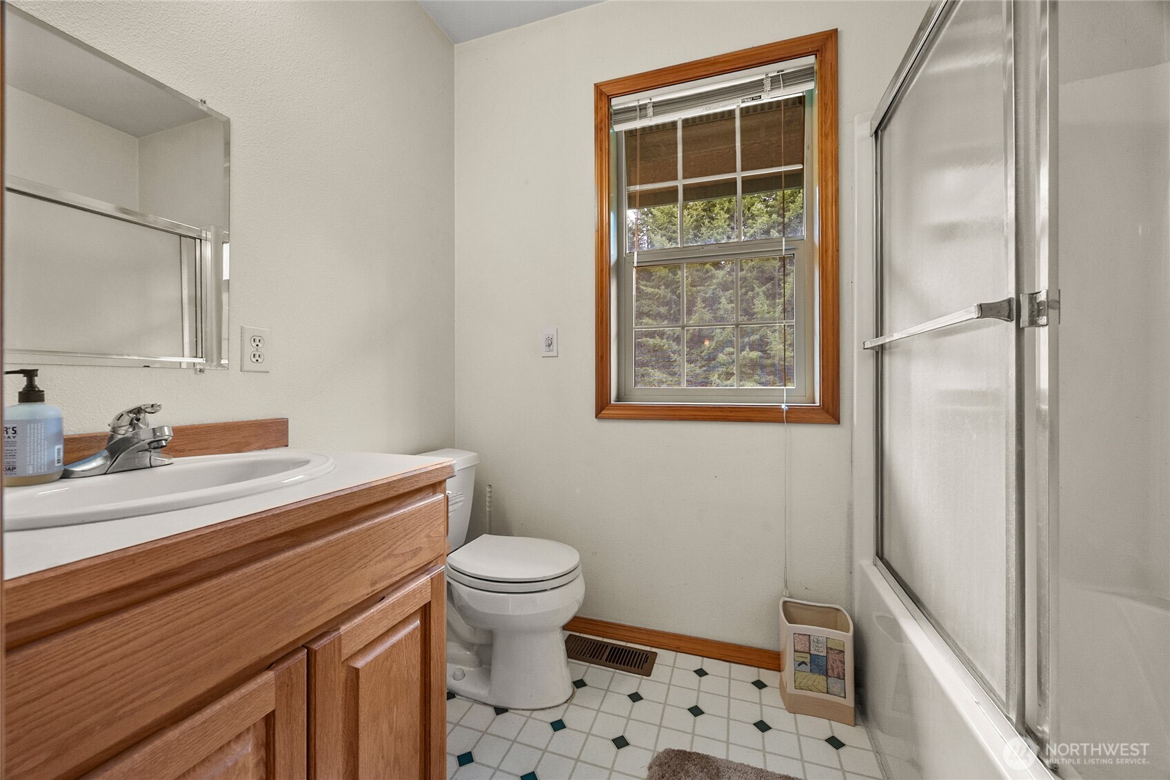 122 Ridge View Drive Randle, WA 98377 - Photo 26 of 40 a bathroom with a sink a toilet a shower and a mirror