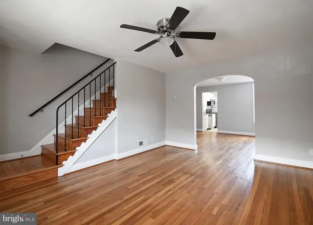 a view of room and wooden floor