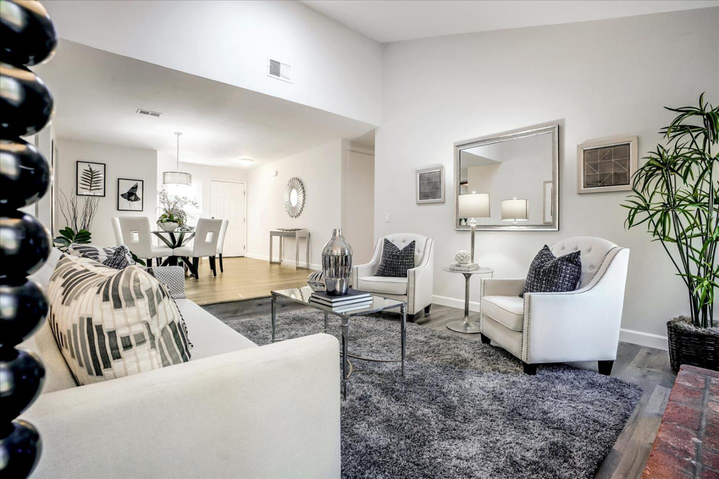 5282 Pebbletree Way San Jose, CA 95111 - Photo 11 of 39 a living room with furniture and wooden floor