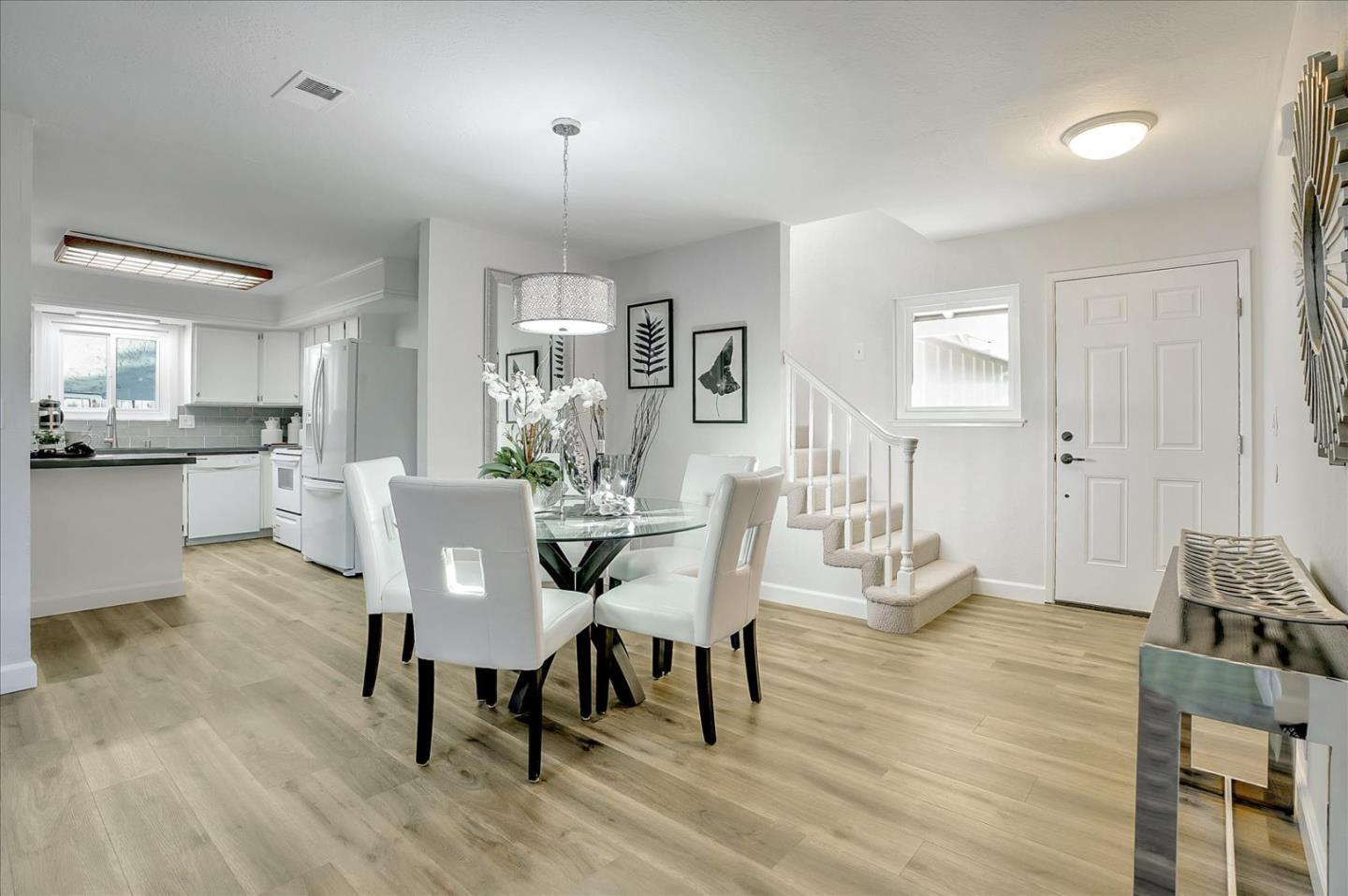 5282 Pebbletree Way San Jose, CA 95111 - Photo 14 of 39 a view of a dining room with furniture and wooden floor